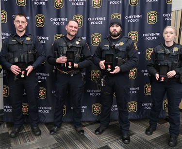 Lifesaving Award - Officer Daniel vanSwearingen, Officer Kilian Sweet, Officer Nathanial Lucero, Officer Audrey McGraw